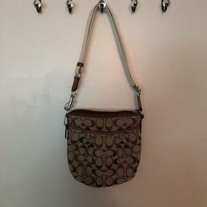Signature Coach cross body bag.